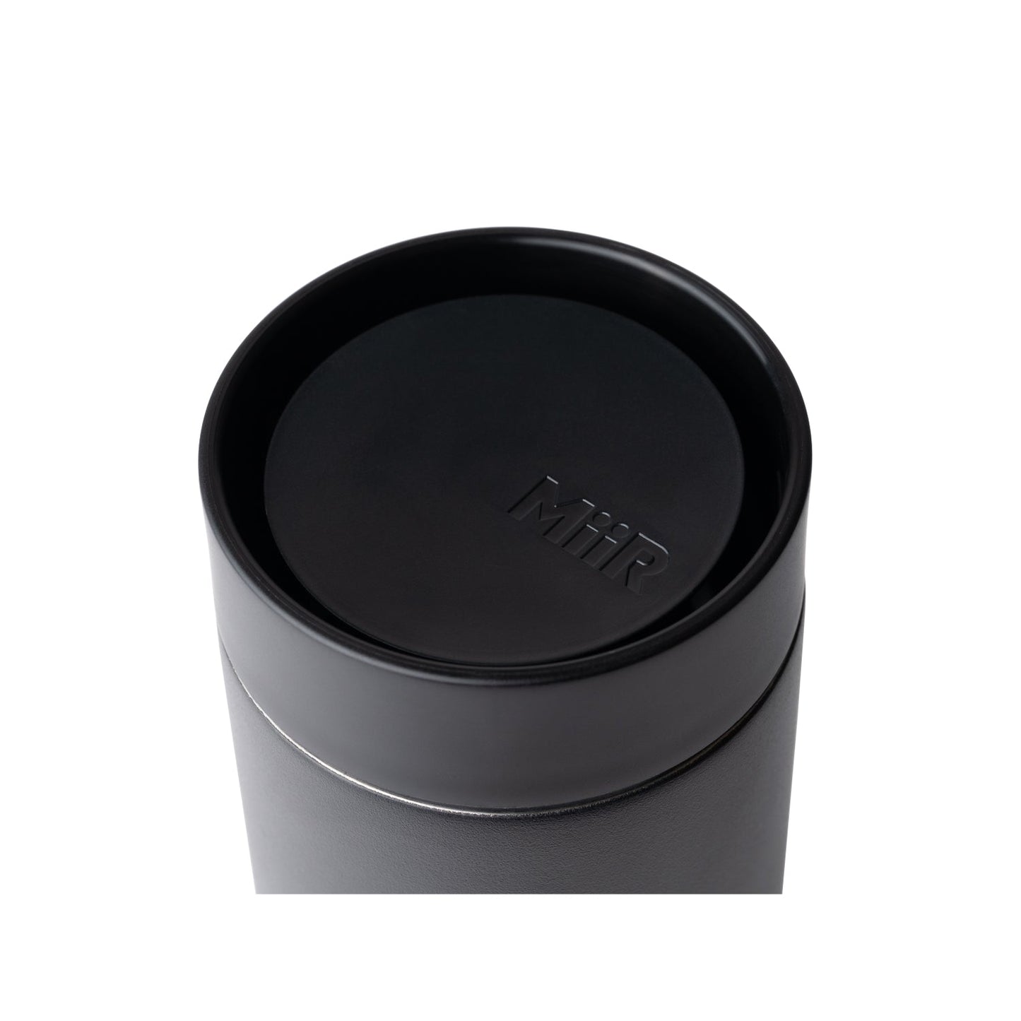 MiiR 360 Traveler Lid in black on top of 360 Traveler close up.